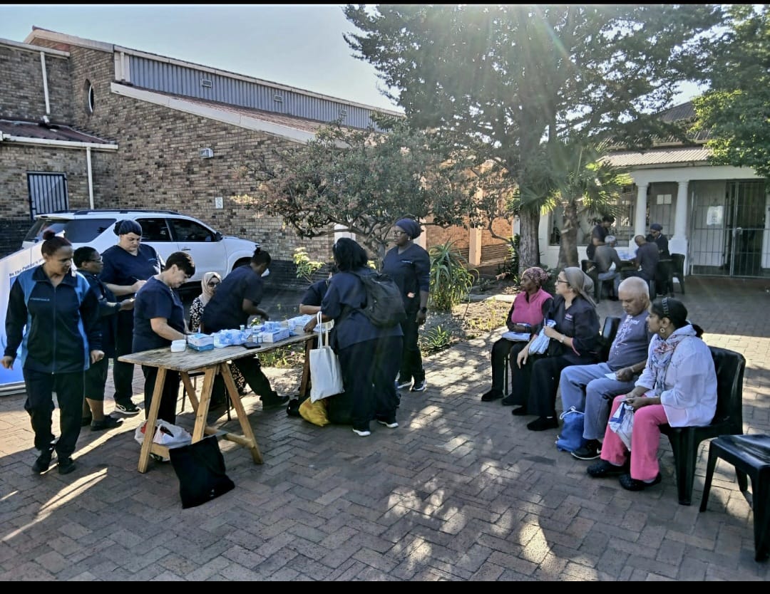 IPI nurses and care workers running a community health outreach day with elderly residents in Cape Town